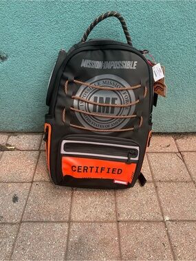 Sprayground Black and Orange 'Mission: Impossible' Certified Backpack